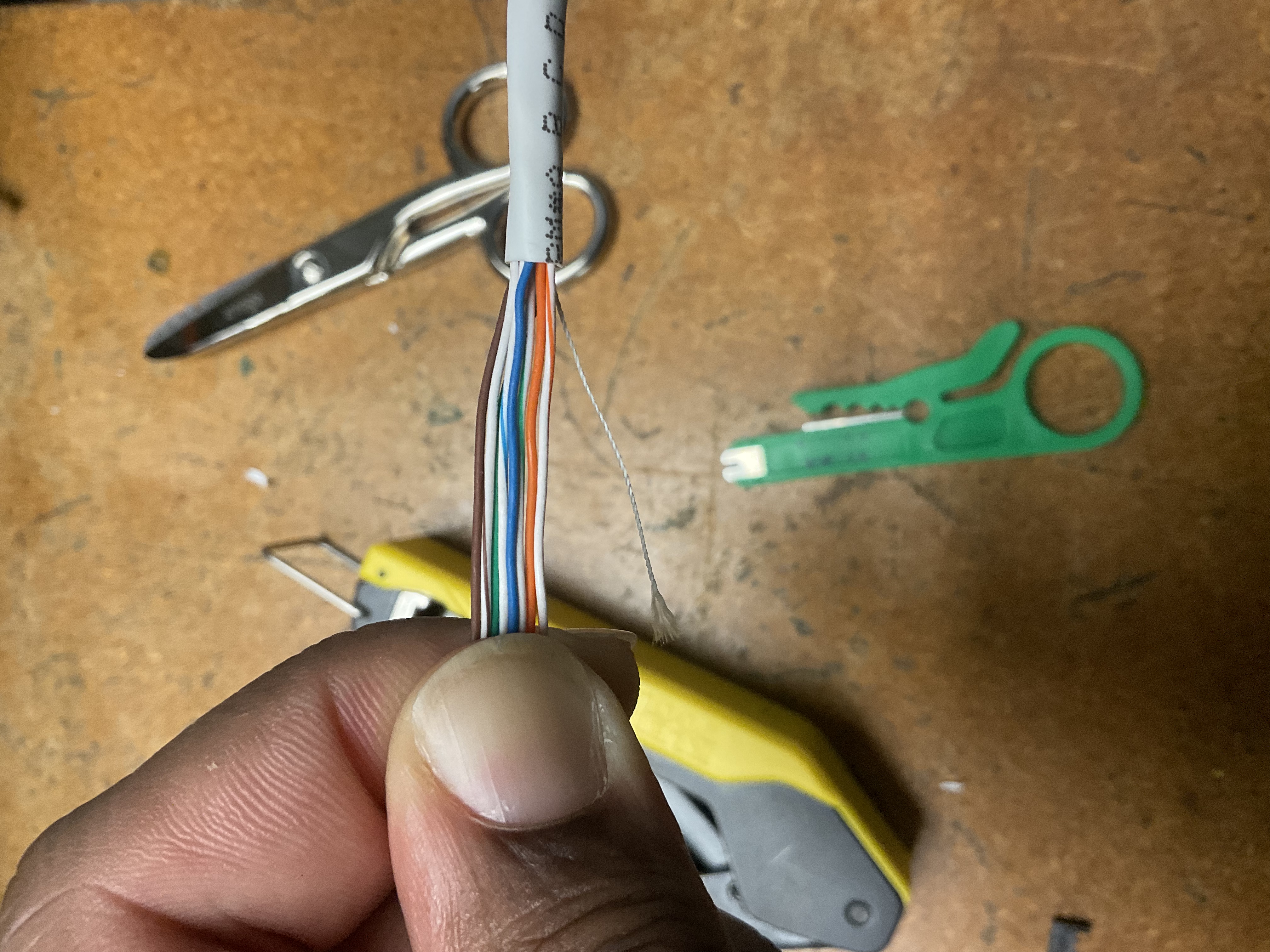 Hand fanning out 8 conductors from Cat 6 cable