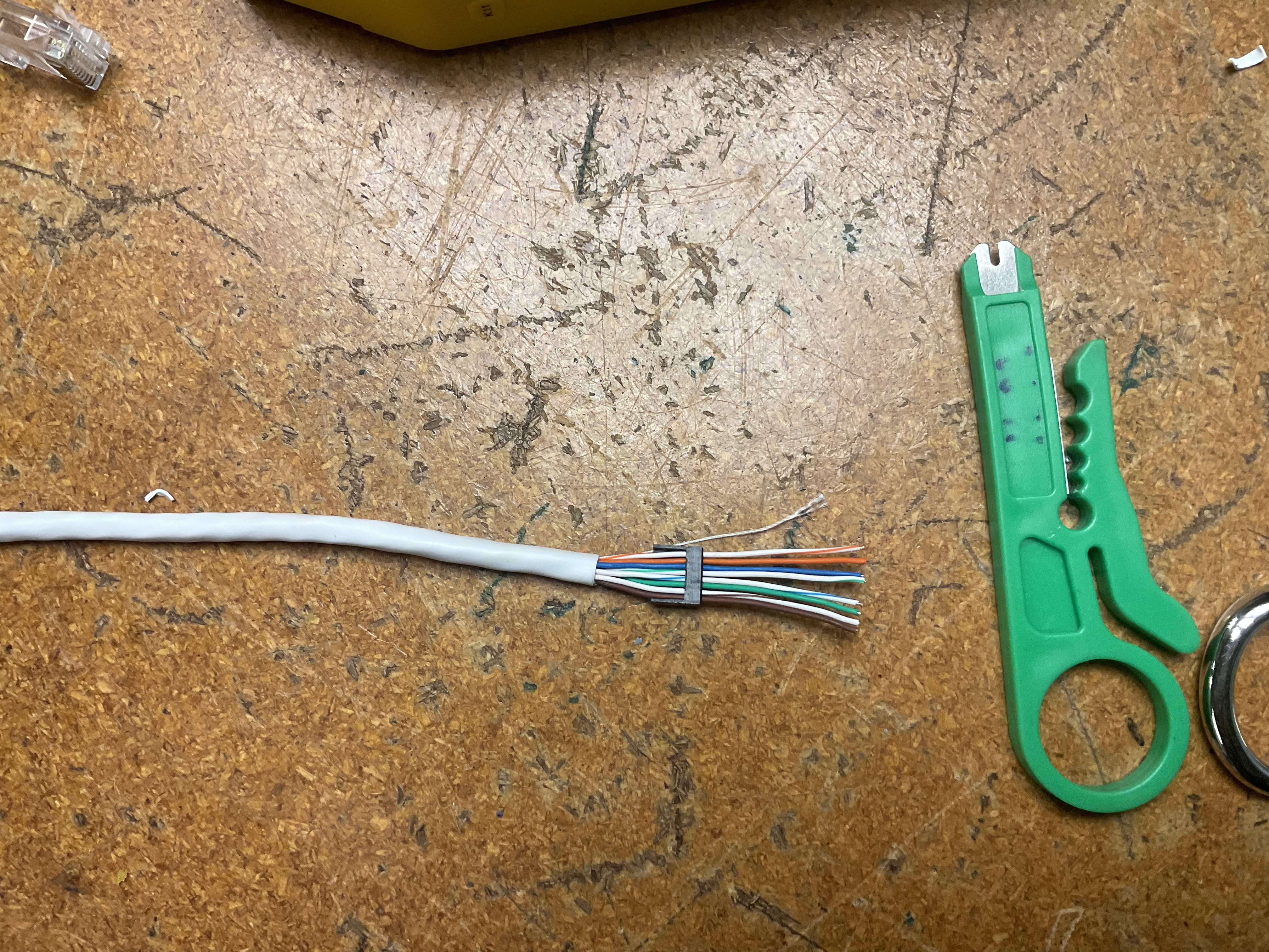 T568B wires loaded into RJ45 plug insert