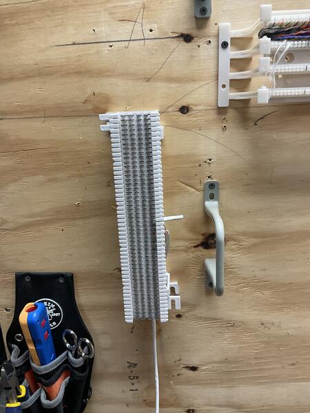 66 block mounted on training wall with punch-down tool