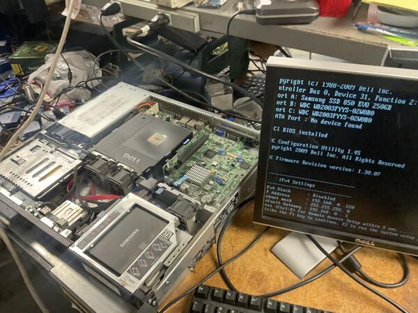 Server workbench setup with BIOS on screen