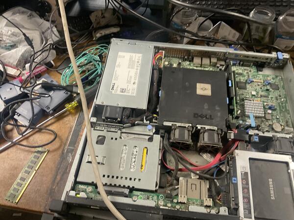 Server internals exposed — RAM and motherboard visible